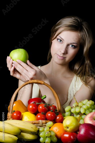Photo: Beautiful girl with fruit and vegetables Beautiful girl with fruit and vegetables