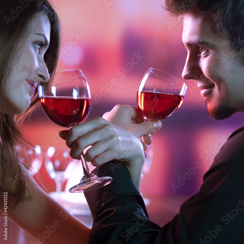 Photo: Couple on date at restaurant Couple on date at restaurant