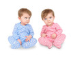 Curious Twin Babies on White