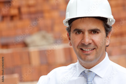 Photo: male engineer at a construction site male engineer at a construction site