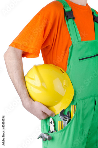 Photo: Repairman in coveralls in industrial concept Repairman in coveralls in industrial concept