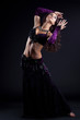 Pretty oriental dancer with long hair