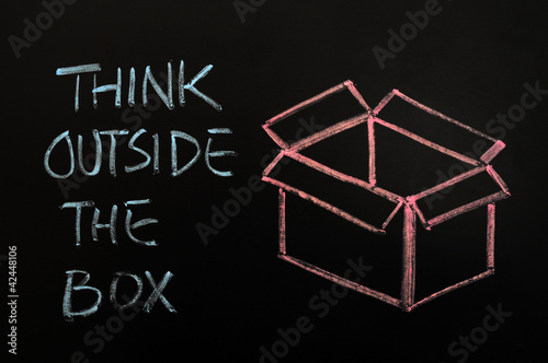 Foto: Chalk drawing - concept of "Think outside the box" Chalk drawing - concept of "Think outside the box"