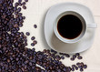 Photo: Coffee cup and grain on background Coffee cup and grain on background