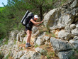 Hiker walking on a rocky path