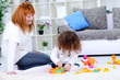 Laughing mother with her child
