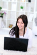 Photo: girl looking at laptop computer girl looking at laptop computer