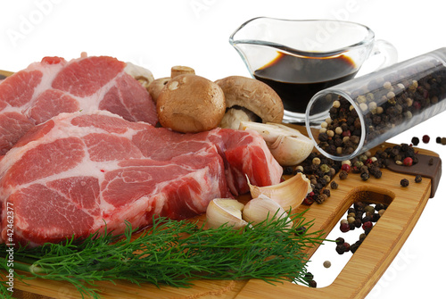 Photo: Beefsteak prepared for cooking with mushrooms spices Beefsteak prepared for cooking with mushrooms spices