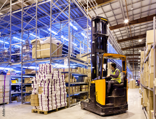 Photo: Worker on forklift Worker on forklift