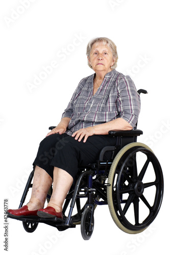 Photo: Unhappy senior woman in wheelchair Unhappy senior woman in wheelchair