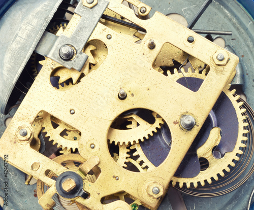 Foto: Mechanism the old alarm clock Mechanism the old alarm clock