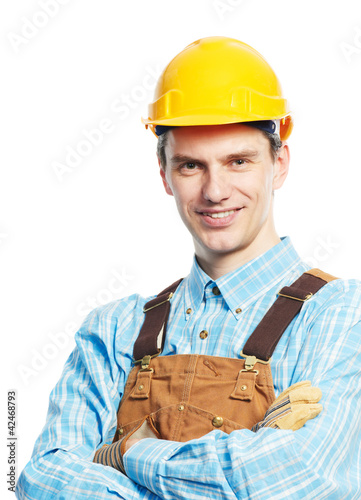 Photo: Happy worker portrait in hardhat and overall Happy worker portrait in hardhat and overall
