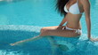 Video: Bikini Female Sunbathing by the Pool Bikini Female Sunbathing by the Pool