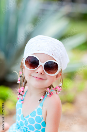 Photo: Portrait of adorable little girl Portrait of adorable little girl