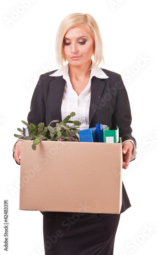 Photo: Displeased secretary with her personal things Displeased secretary with her personal things