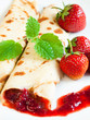 Rolled pancakes with strawberries