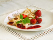 Rolled pancakes with strawberries