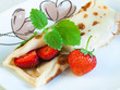 Rolled pancakes with strawberries
