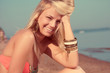 Foto: Portrait of beautiful young smiling women in a swimsuit Portrait of beautiful young smiling women in a swimsuit