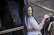 Girl in the stable