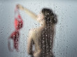 Foto: young woman in the shower young woman in the shower