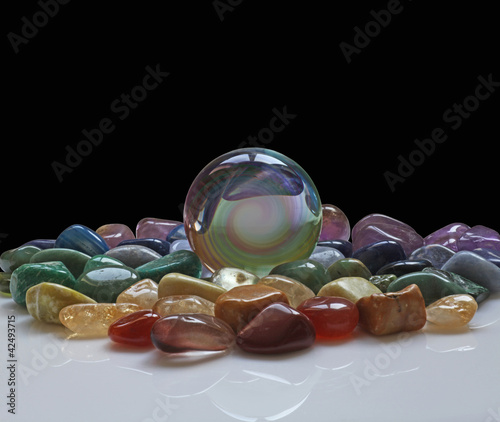 Photo: Crystal Ball surrounded by healing crystals Crystal Ball surrounded by healing crystals