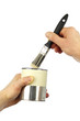 Paintbrush and Paint Can Held by Hands
