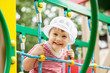 Happy two-year child in playground area