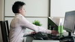 Young punk businesswoman drinking coffee during work