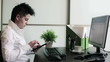 Young punk businesswoman with tablet computer in the office
