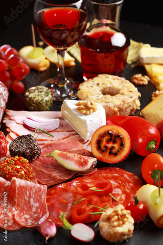 Photo: Antipasto catering platter with red wine Antipasto catering platter with red wine