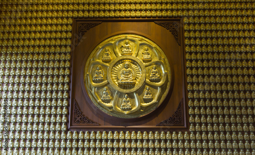 Photo: Gold Buddha on the wall Gold Buddha on the wall