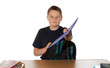 Foto: Teenager handing in his assignment Teenager handing in his assignment