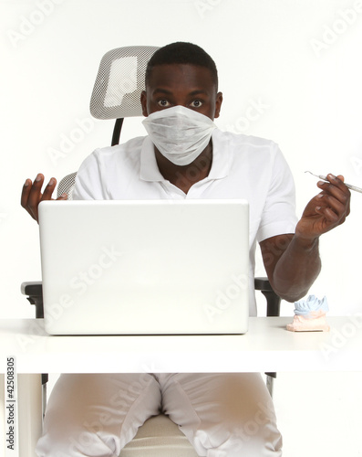 Photo: Arzt mit Laptop Arzt mit Laptop