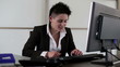 Excited punk businesswoman rasing hands in the office
