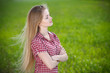 Female enjoying fresh air with closed eyes