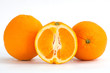 Sliced orange fruit segments isolated on white background