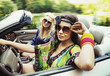Photo: Two young women driving a car Two young women driving a car