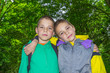 Portrait of two hugging boys, tweens