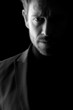 Low key portrait of mid age man