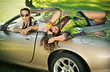 Handsome couple in cabriolet