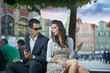 Handsome couple with mobile