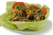 Stewed in sour cream rabbit meat in cabbage leaf