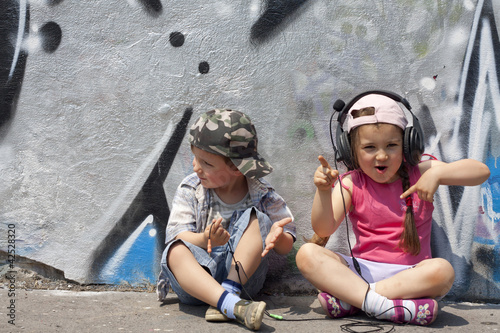 Photo: Children listen to music concept Children listen to music concept