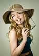 blond girl with summer hat and sunglasses