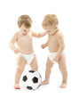 Two babies playing soccer ball over white background. Kids physi