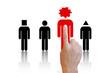 Hand choosing the red person from a group