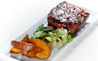 Glazed Pork Ribs with salad and baked potatoes