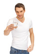 man in white shirt with glass of water