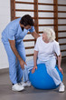 Physical Therapist helping a Patient